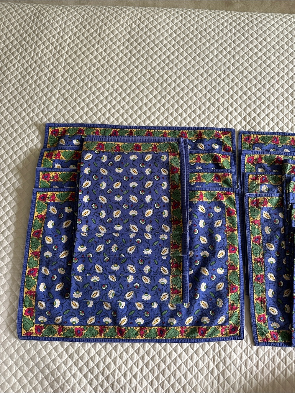 Williams Sonoma, 8 clothe placemats and 8 matching napkins, very good condition.